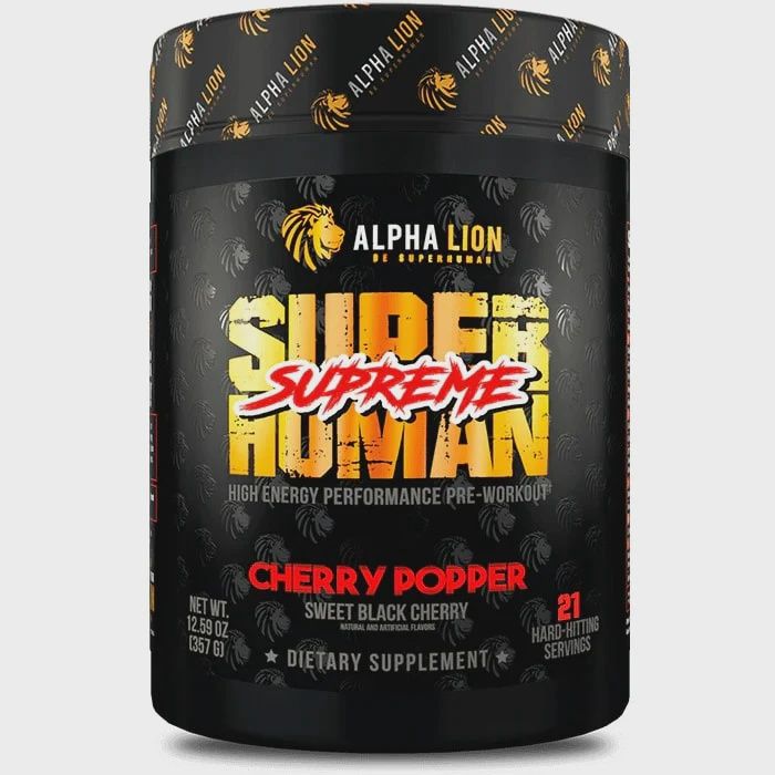 A black and gold Alpha Lion Superhuman Supreme pre-workout supplement container with Cherry Popper flavor. Bold, energetic 
