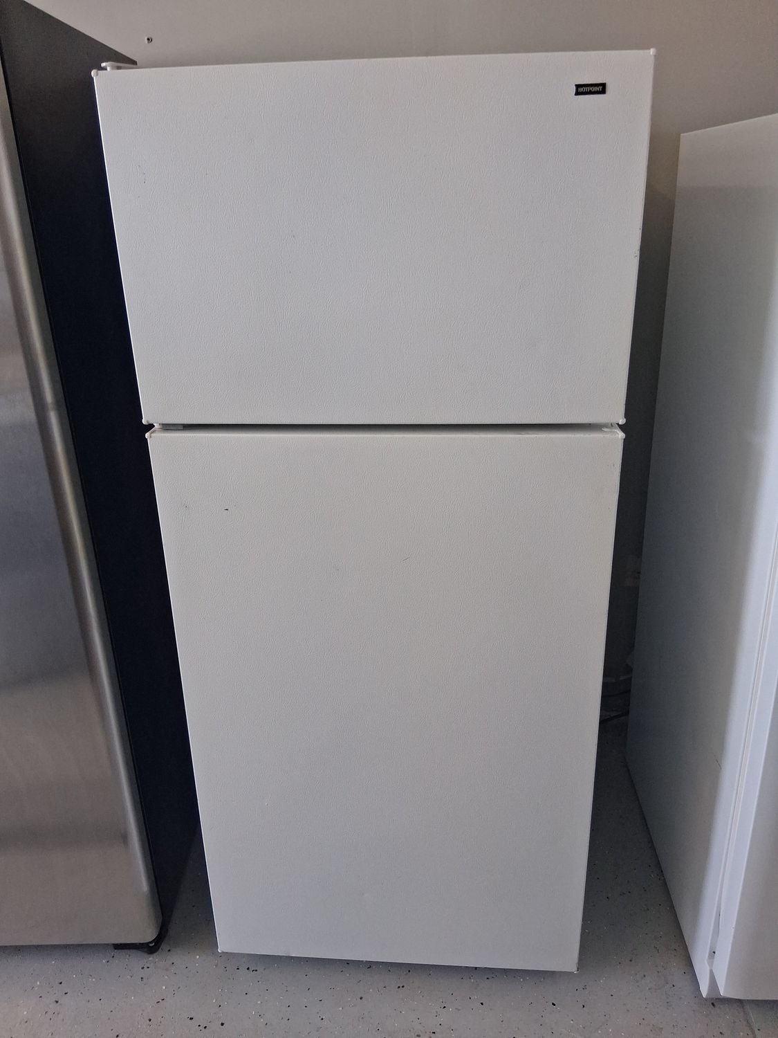 Top Freezer Refrigerator Model #HTR17DBSERWW