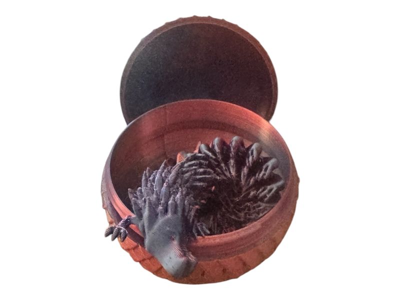 Baby dragon with egg