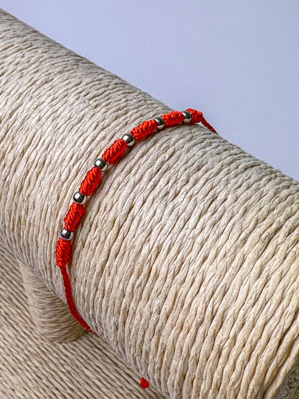 PULSERA HILO ROJO 7 NUDOS CON ACERO
