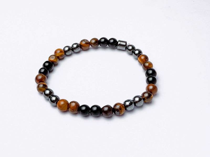 PULSERA TRIPLE PROTECCION Y PROSPERIDAD (TURMALINA NEGRA, PIRITA, OJO DE TIGRE)