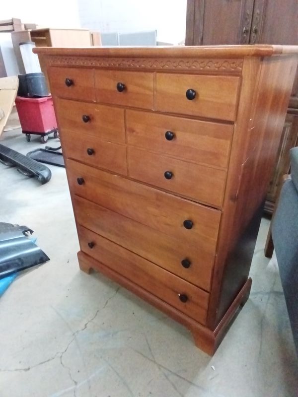 Brown dresser with drawers