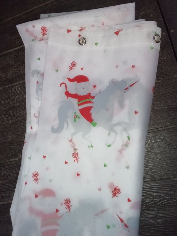Christmas plastic shower curtain with Santa riding a unicorn