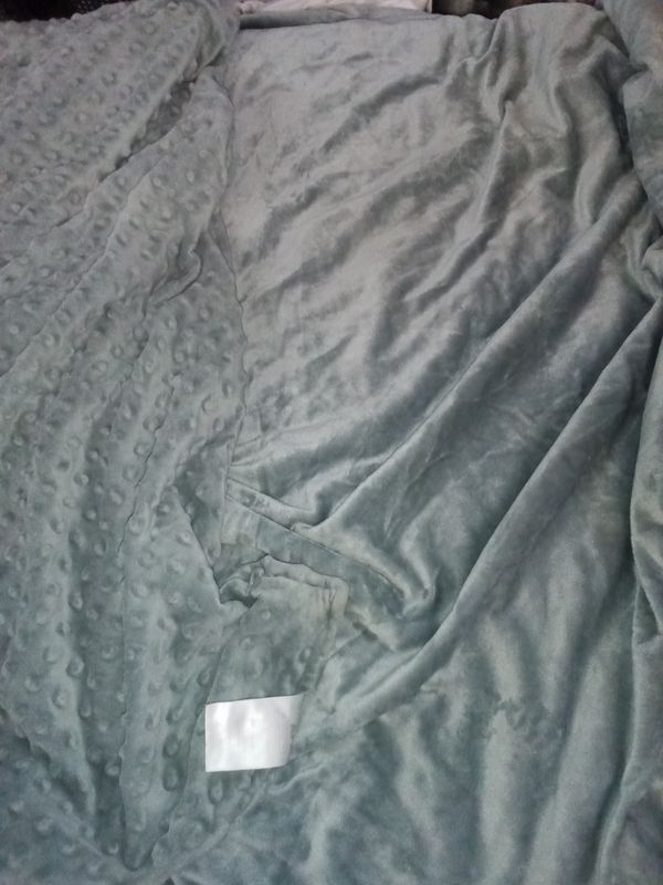 Gray ILYAPA double-sided weighted blanket cover one with raised bumps the other side smooth