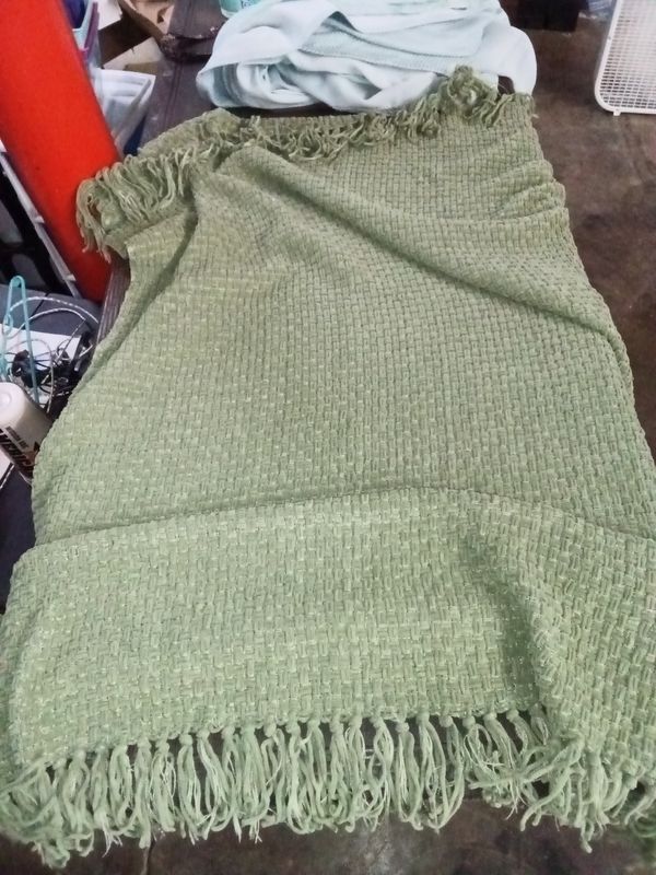 Olive green blanket with waffle pattern