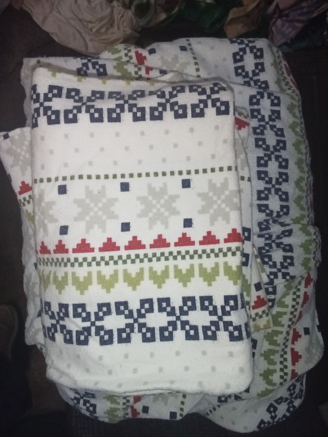 Cuddle Duds Heavyweight Cotton Flannel Queen Sheet Set featuring a festive "Christmas Tree Fair Isle" pattern.