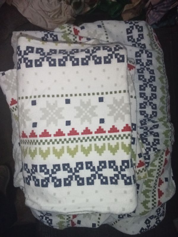 Cuddle Duds Heavyweight Cotton Flannel Queen Sheet Set featuring a festive "Christmas Tree Fair Isle" pattern.
