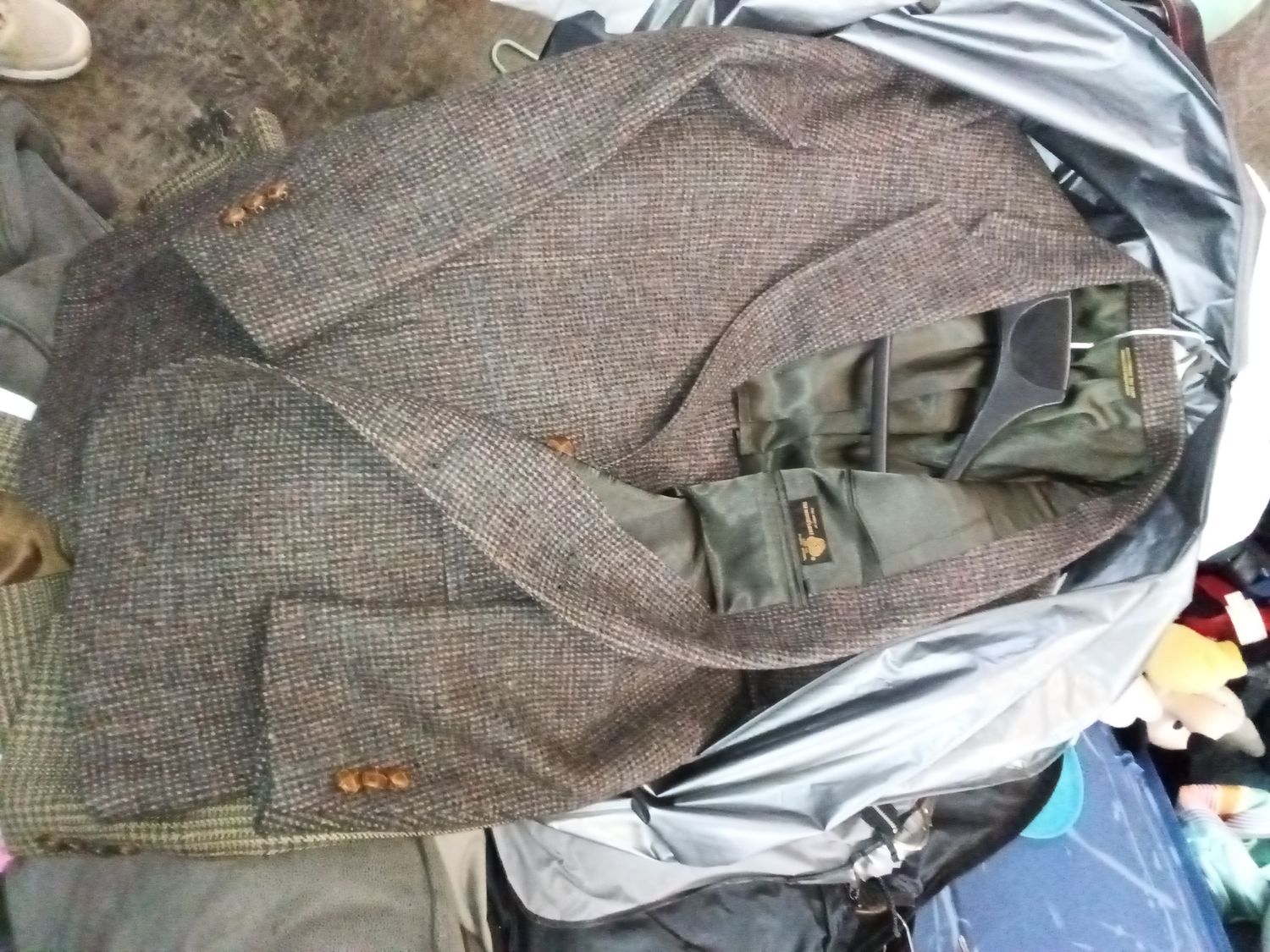 Vintage Stafford British Collection blazer is crafted from brown tweed and features leather-covered buttons.