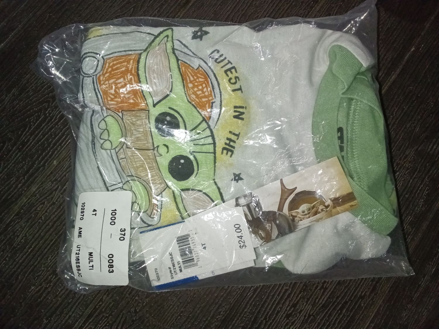 Star Wars The Mandalorian toddler boy's lightweight pullover top featuring a "Baby Yoda" (Grogu) graphic that reads "Cutest in the Galaxy".
