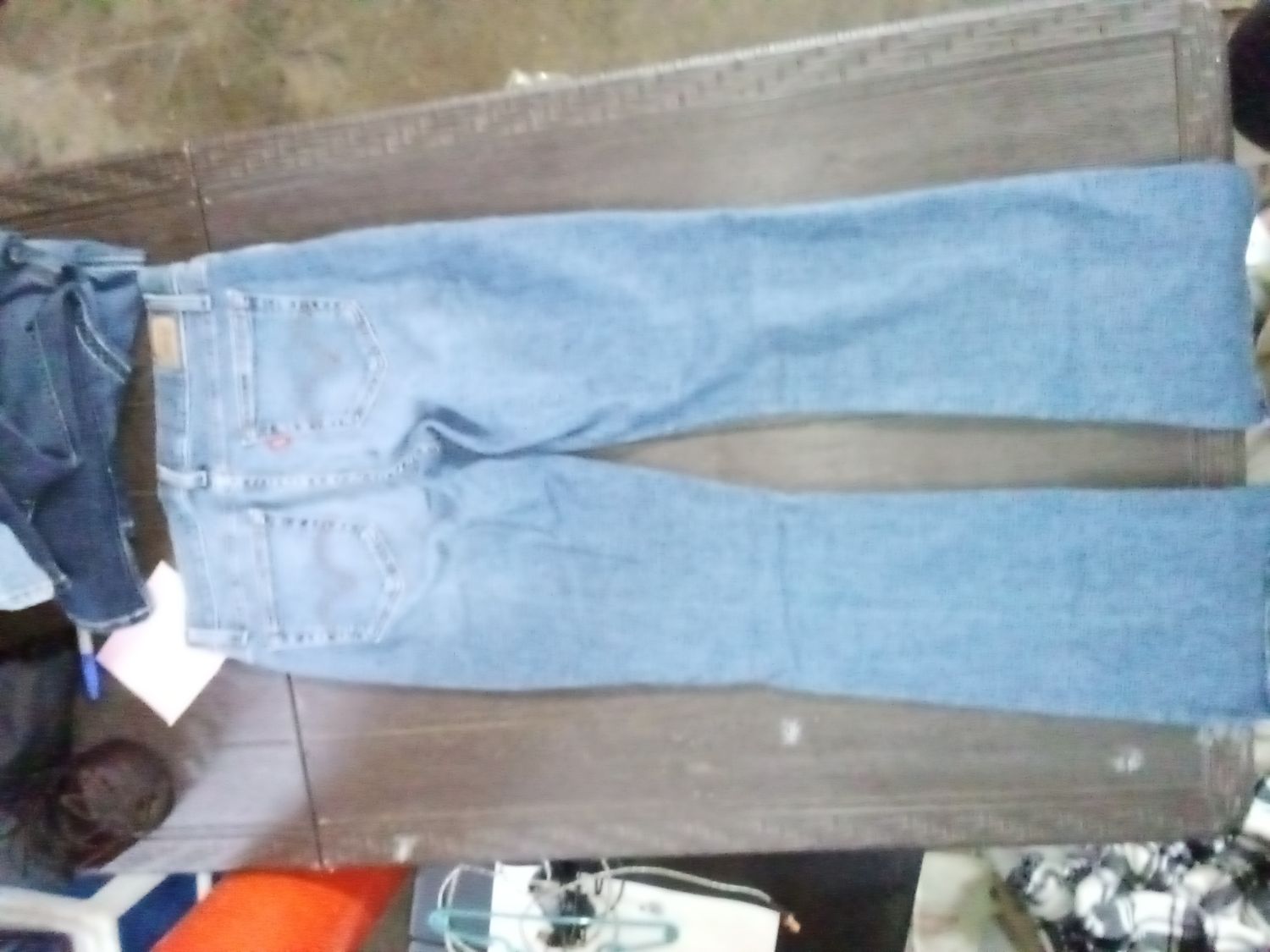 Levi's 529 Curvy Boot Cut jeans in a medium-wash blue denim. Size 8