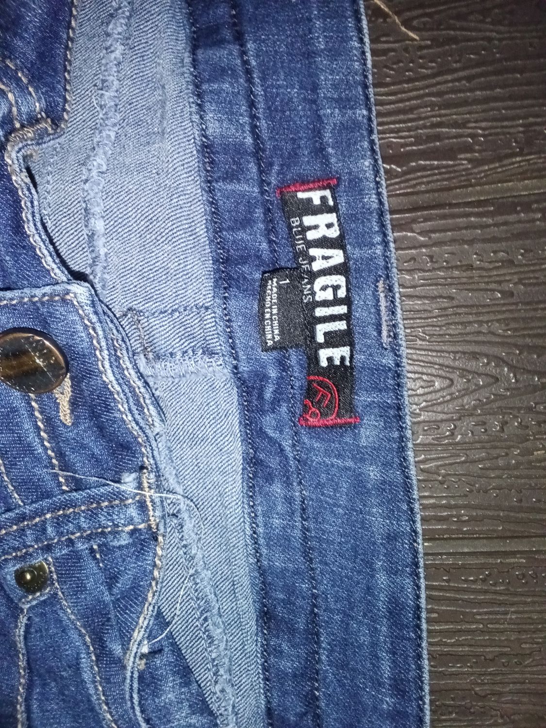 Fragile and feature a size 1 tag.