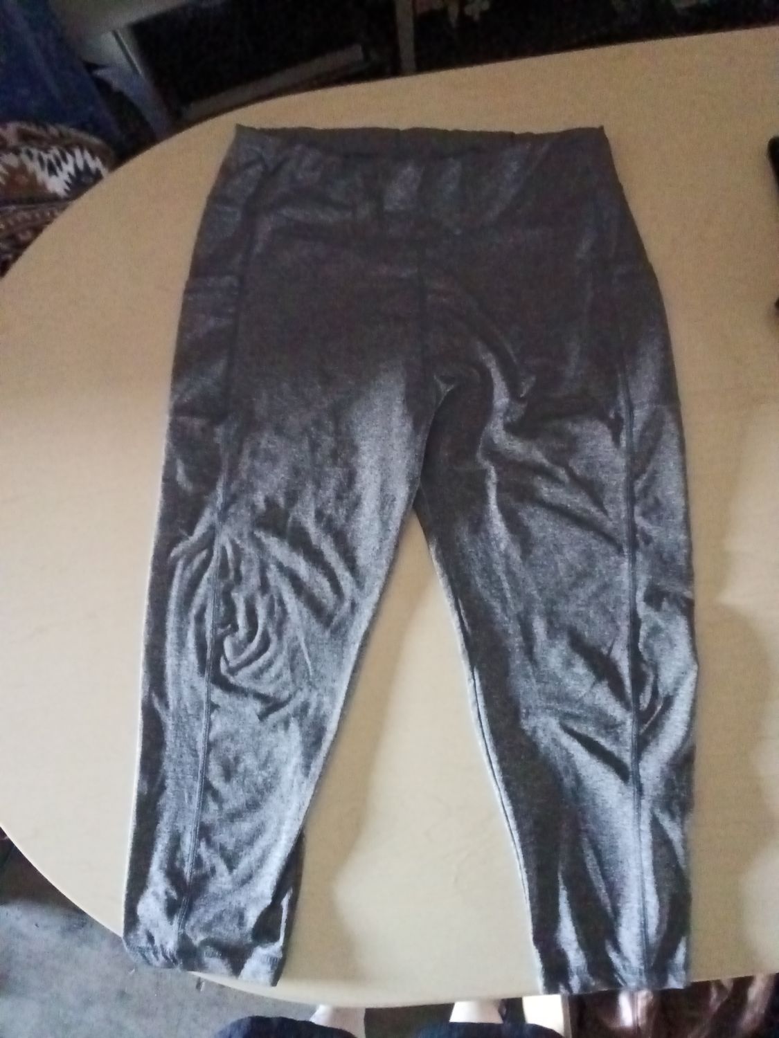 heather gray activewear garment features a 2X size label. (Yoga pants)
