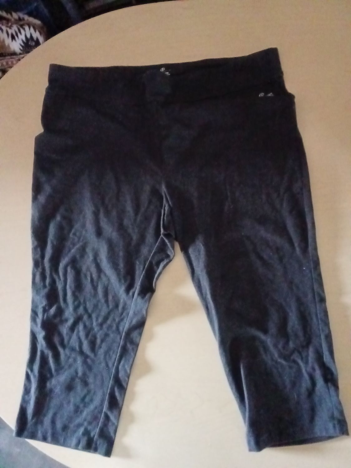 black leggings are by Spalding and feature a comfortable, wide-set 1X waistband.