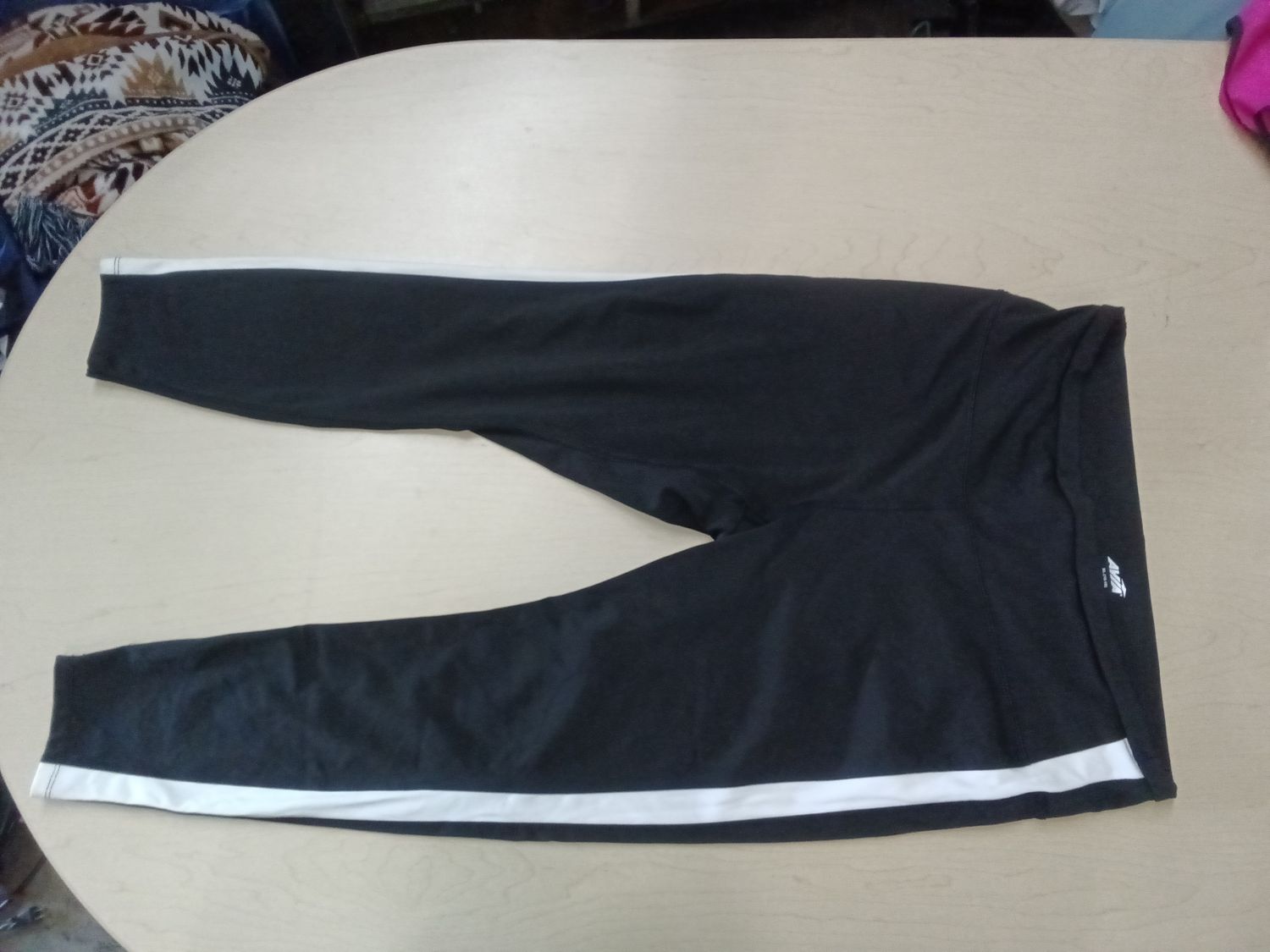 black athletic leggings are from Avia XL