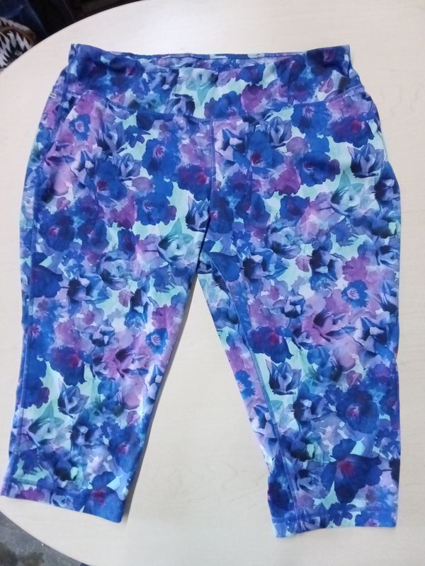 Danskin Now leggings feature a purple floral print XL