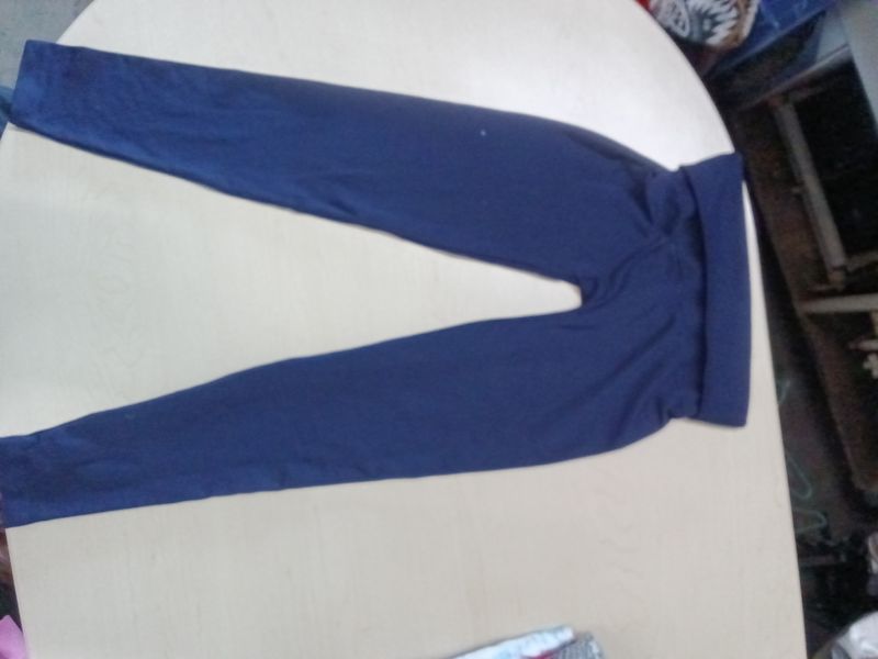 Breezies brand garment is a navy blue, size large