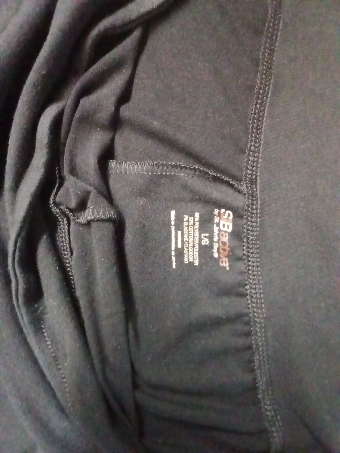 Black SJB Active by St. John's Bay activewear pants featuring a printed interior size Large
