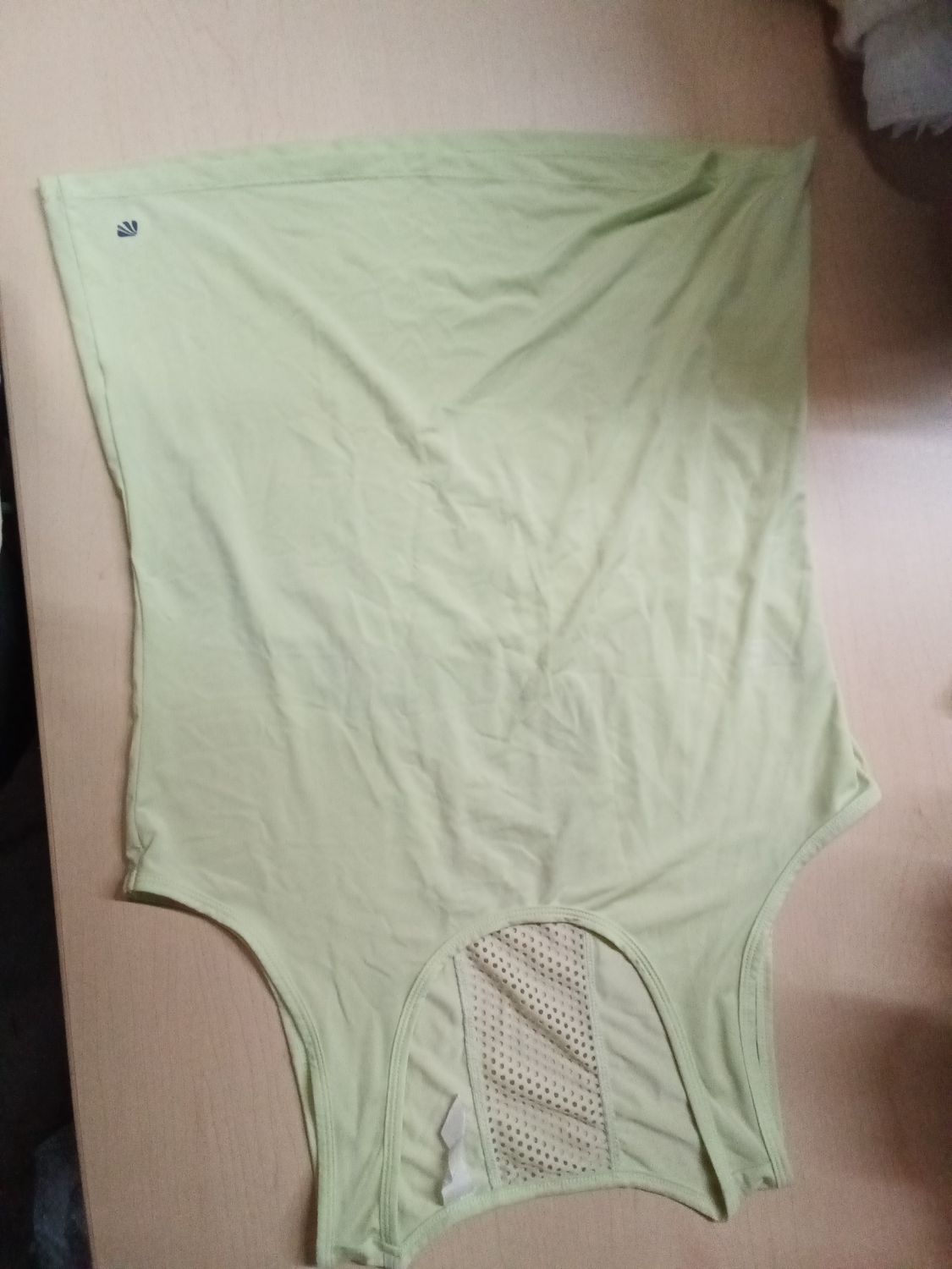 lime green Marika Cycle House mesh-panel activewear tank top featuring a breathable cutout back design. Size unknown