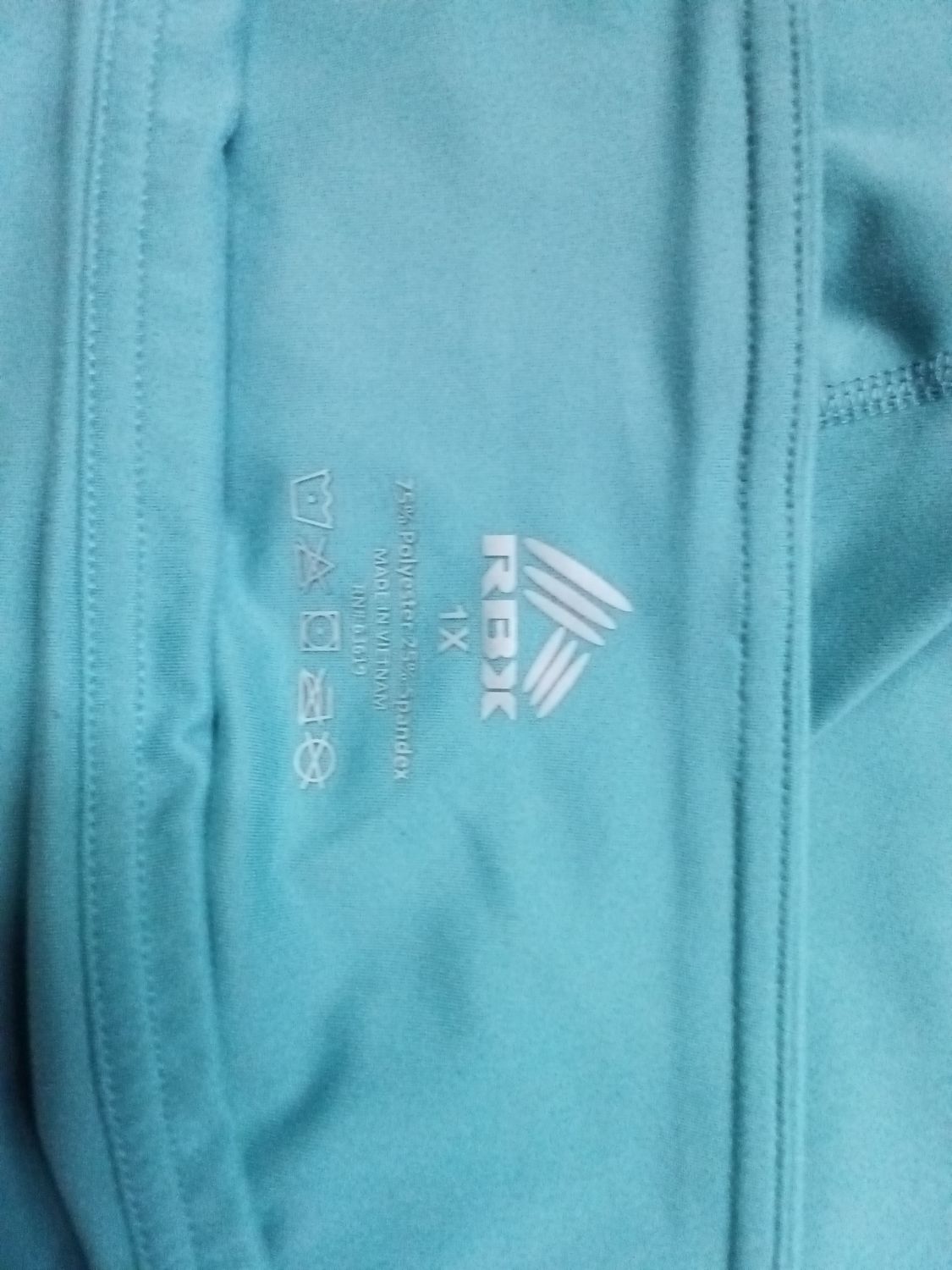 light blue RBX women's athletic shorts featuring a wide waistband size1X