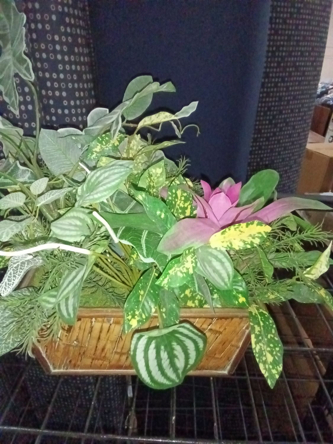 mixed silk artificial tropical plant arrangement in a woven bamboo basket planters