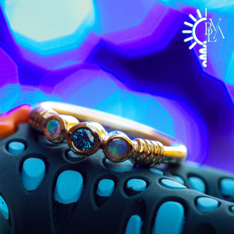 Faraway Genuine White Opal, Ocean Blue Diamond Outward Facing Seam Ring 16g 3/8" 14k Yellow Gold
