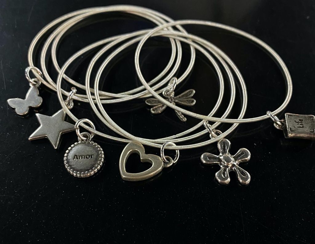 Semanario plata con Dijes 7 piezas