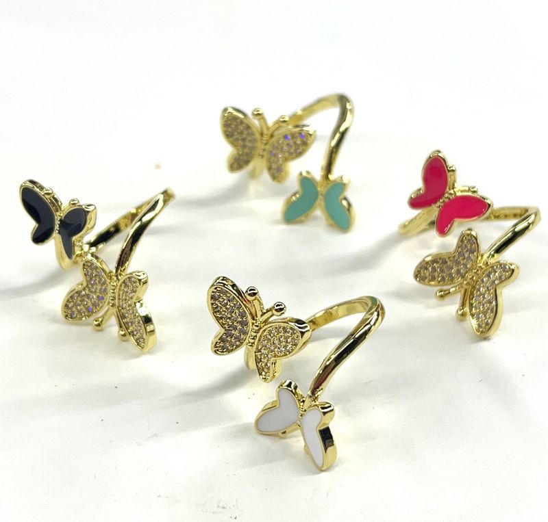Butterflies pave/enamel ring
