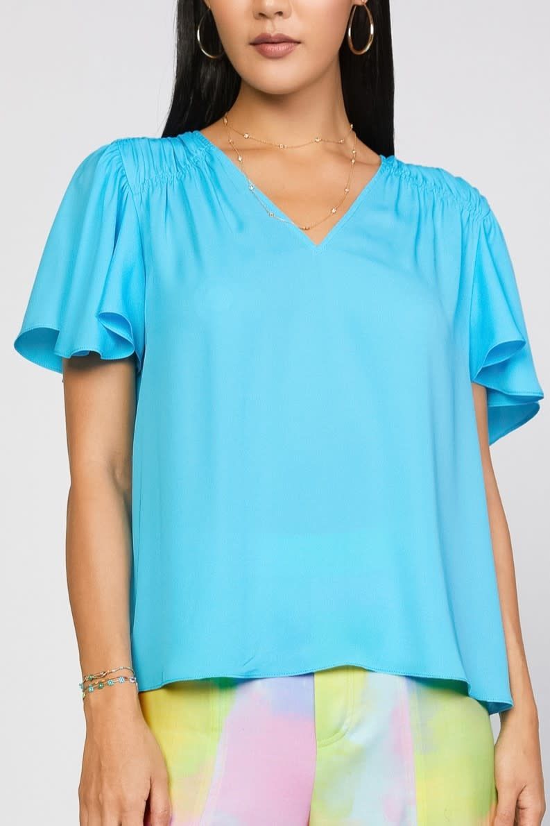 V NECK FLUTTER SLV TOP WITH SHIRRED SHOULDER DETAIL