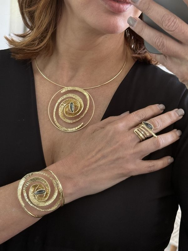 Golden spiral jewelry (sold separately)