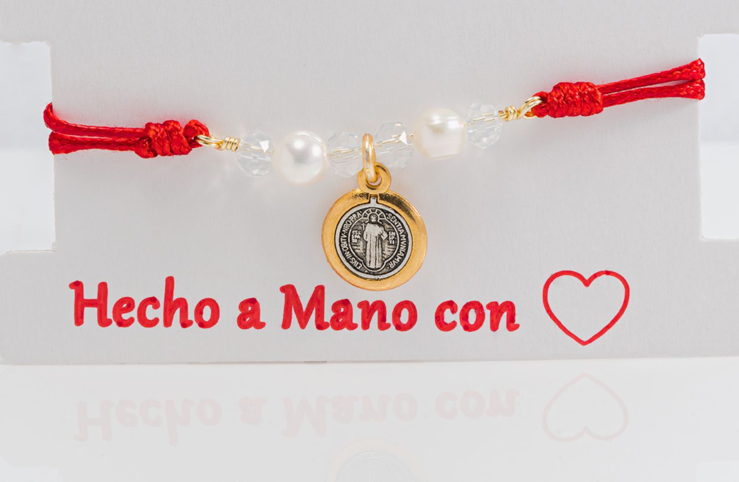 Pulseras Rojas tejidas con Dije San Benito