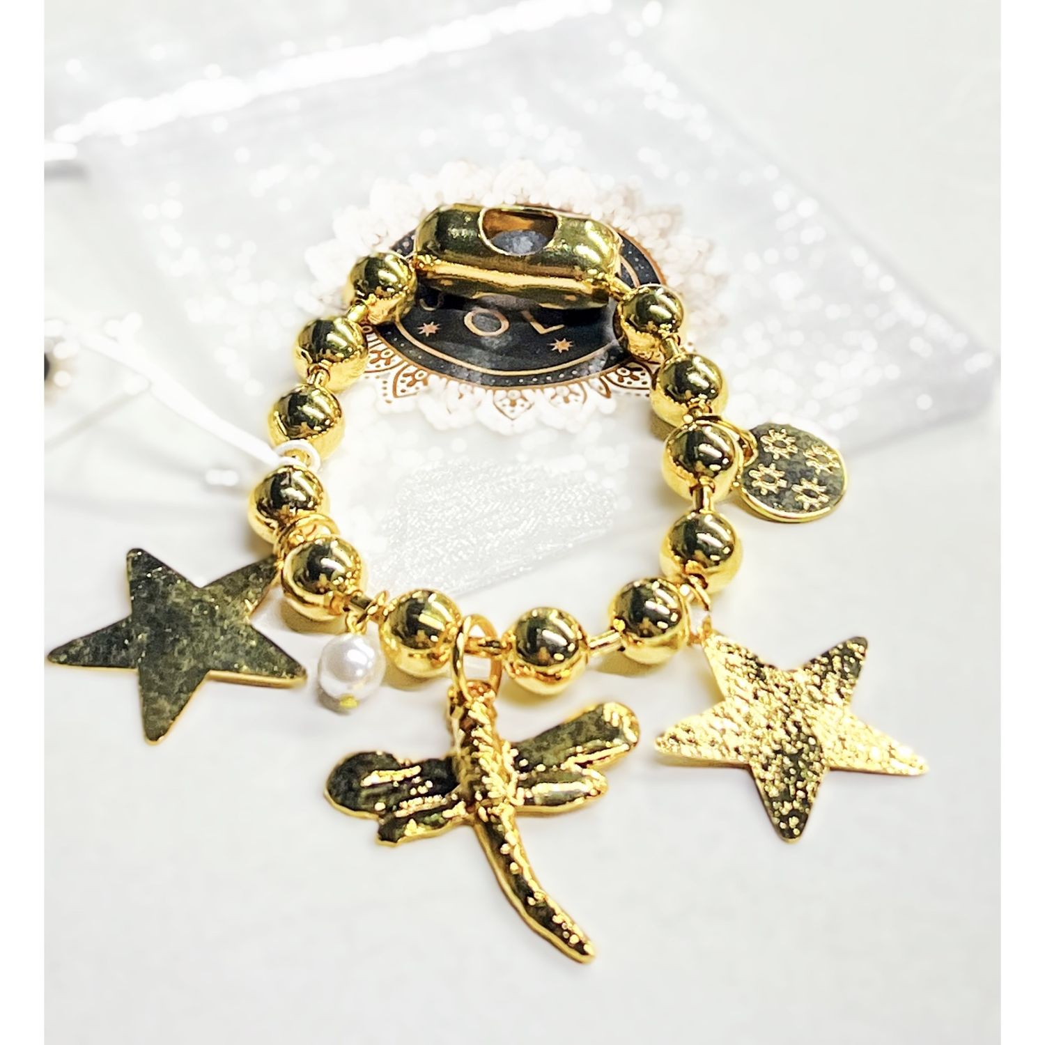 2 star and dragonfly. 10m ball bracelet