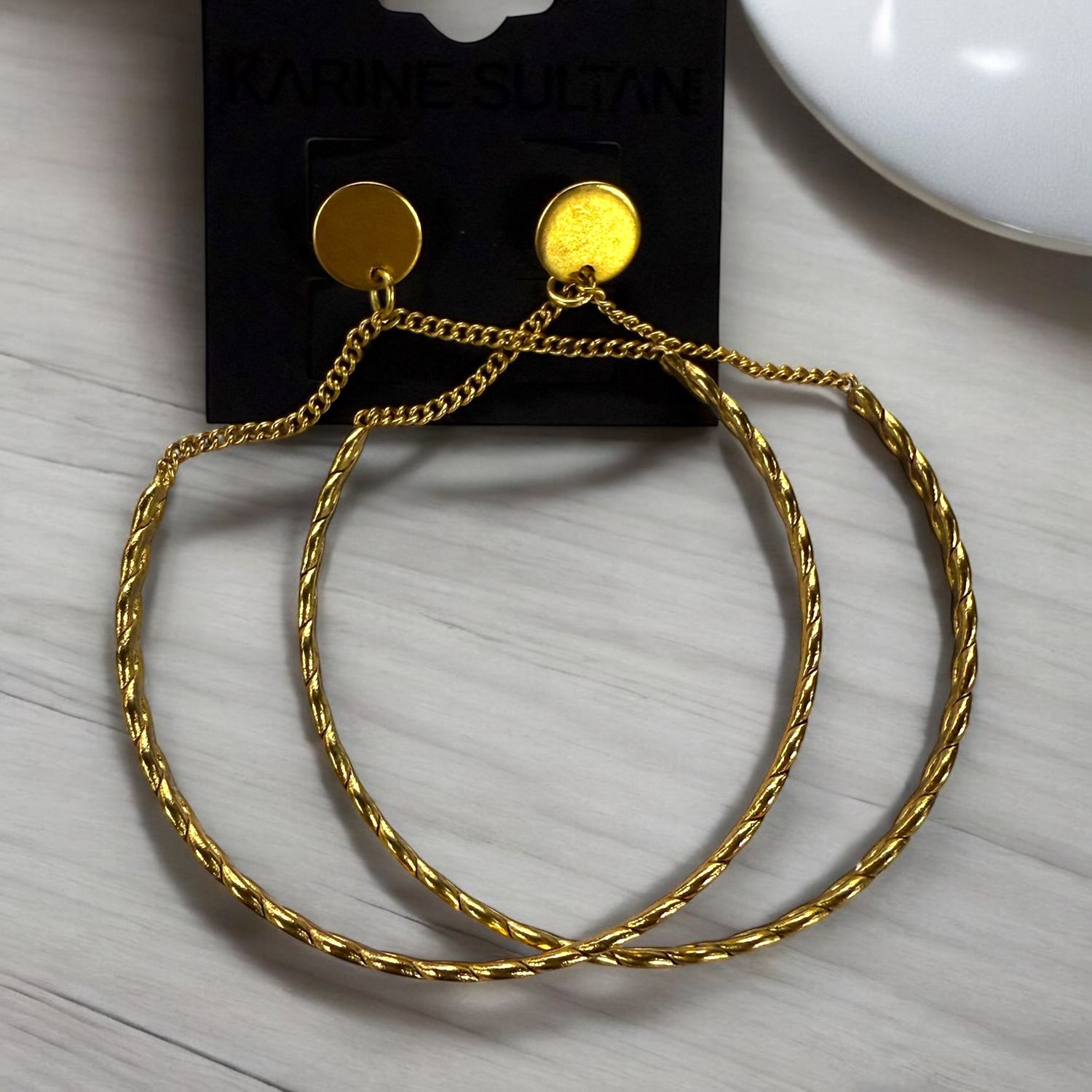Twist gold hoops
