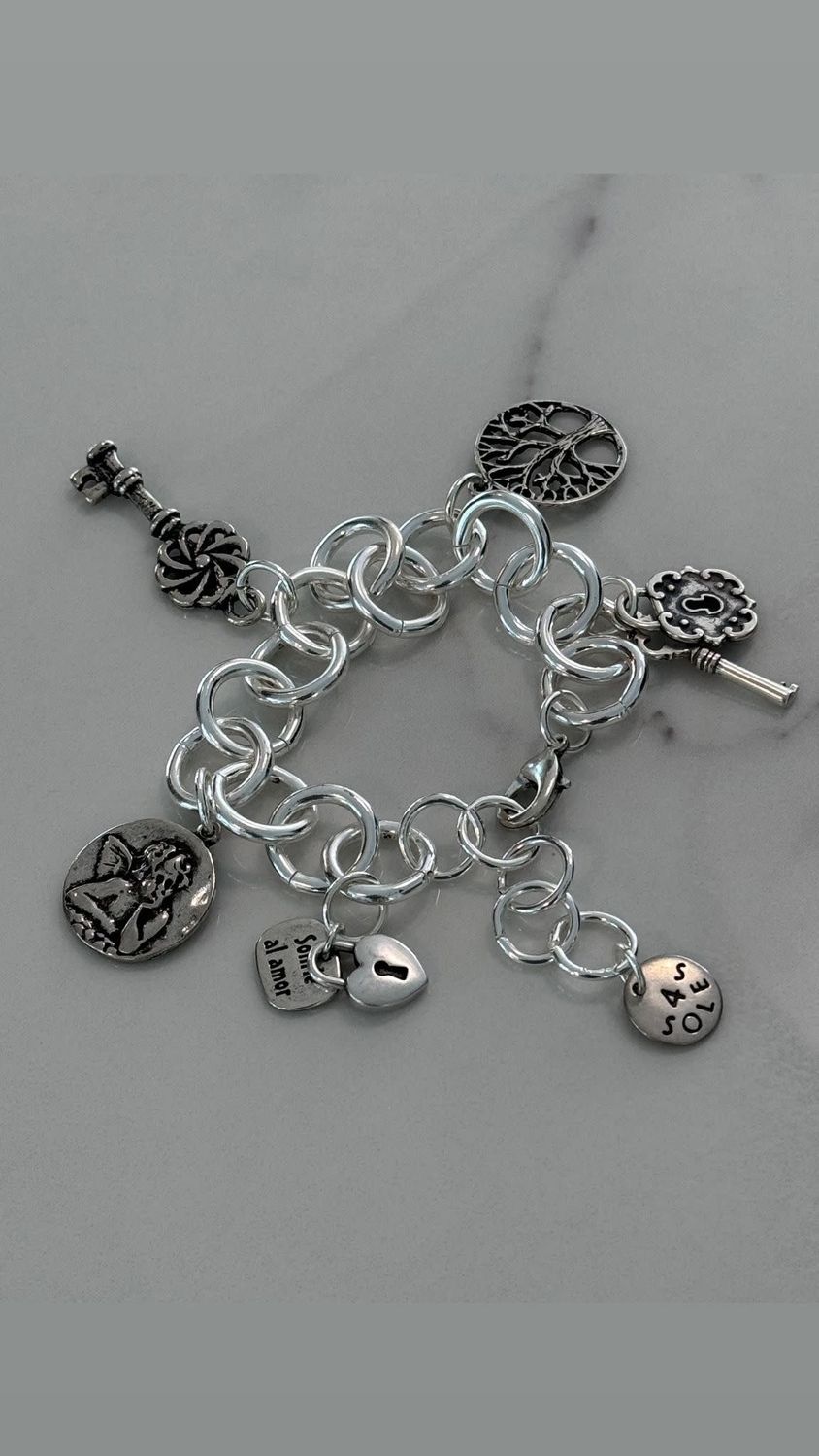 multi charms 4 Soles live tree