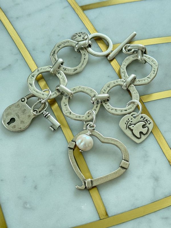 SILVER HEART AND CHARMS BRACELET