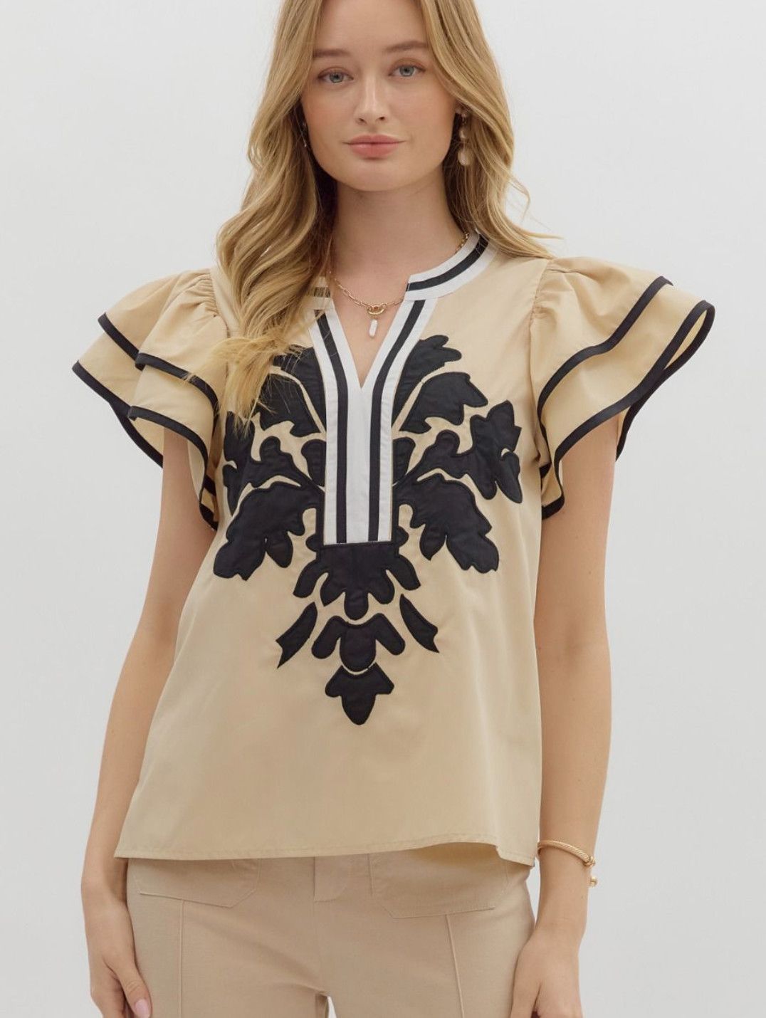 Solid flutter sleeve mutlicolor accent V-neck top