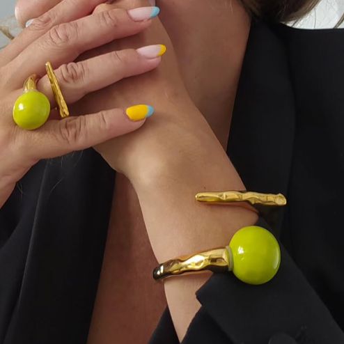 Flecha set Carolina Olivares Gold