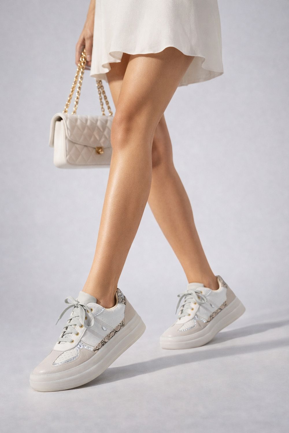 4 Soles Luxe Snake Sneaker