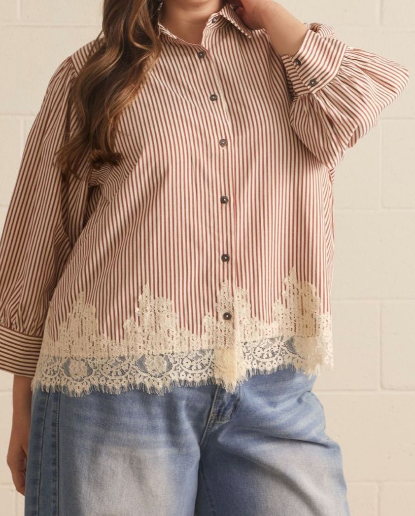 3/4 puff sleeve top featuring lace trim