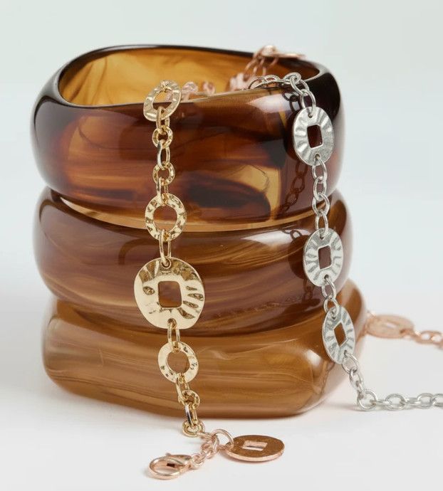 STAMPED METALLIC DONUT LINK BELT