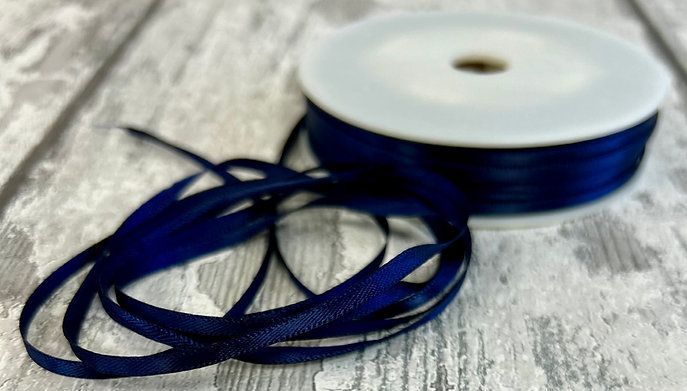 Black Double Sided Satin Ribbon 3mm wide Black Double Sided Satin Ribbon 3mm wide