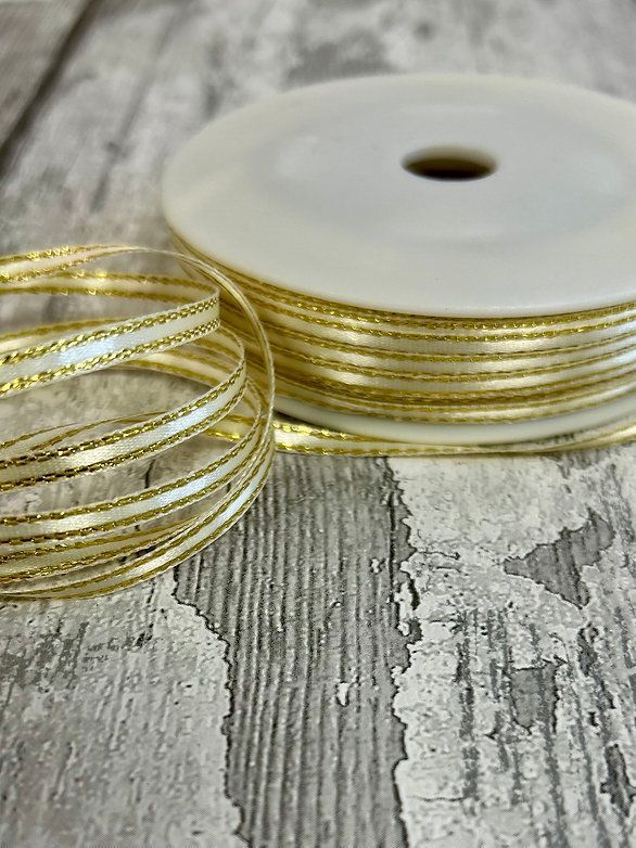 Cream Single Sided Satin Ribbon Lurex Edge 3mm wide Cream Single Sided Satin Ribbon Lurex Edge 3mm wide