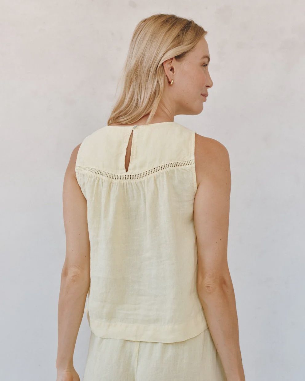 Sleeveless Trimmed Yoke Seam Top