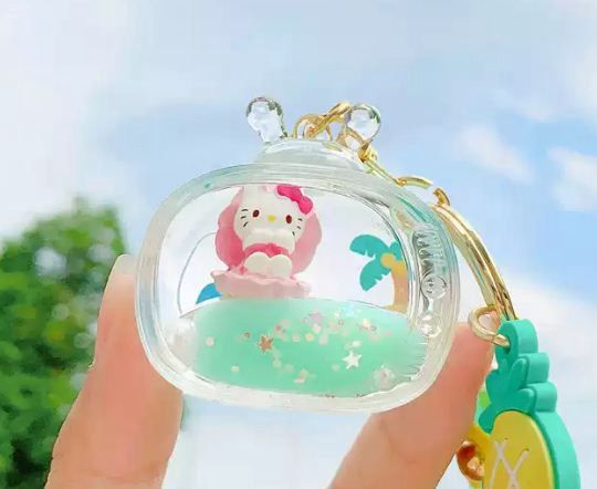 HK with pineapple keychain