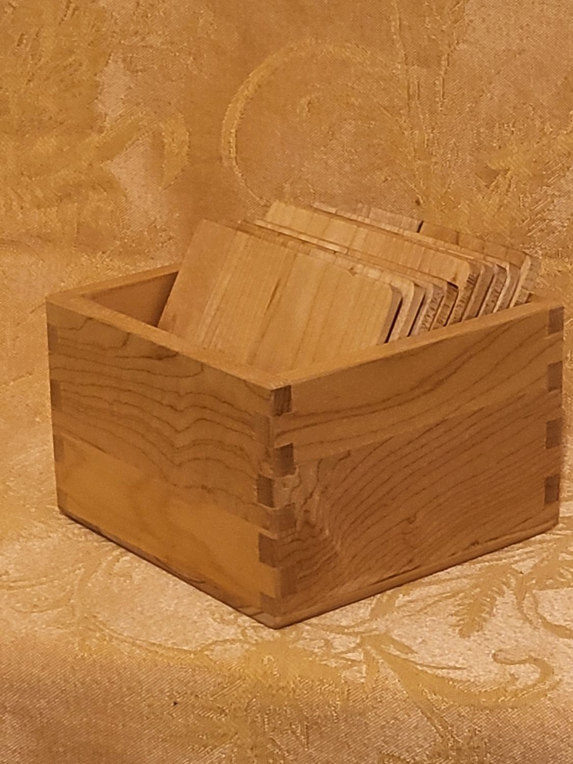 Hard maple coasters with storage container