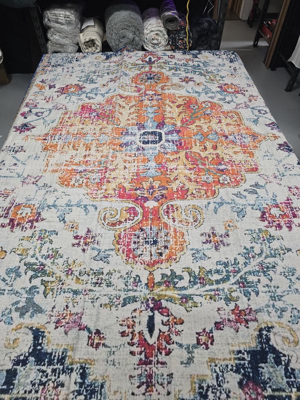 6 x 9 feet area rug, orange blue white