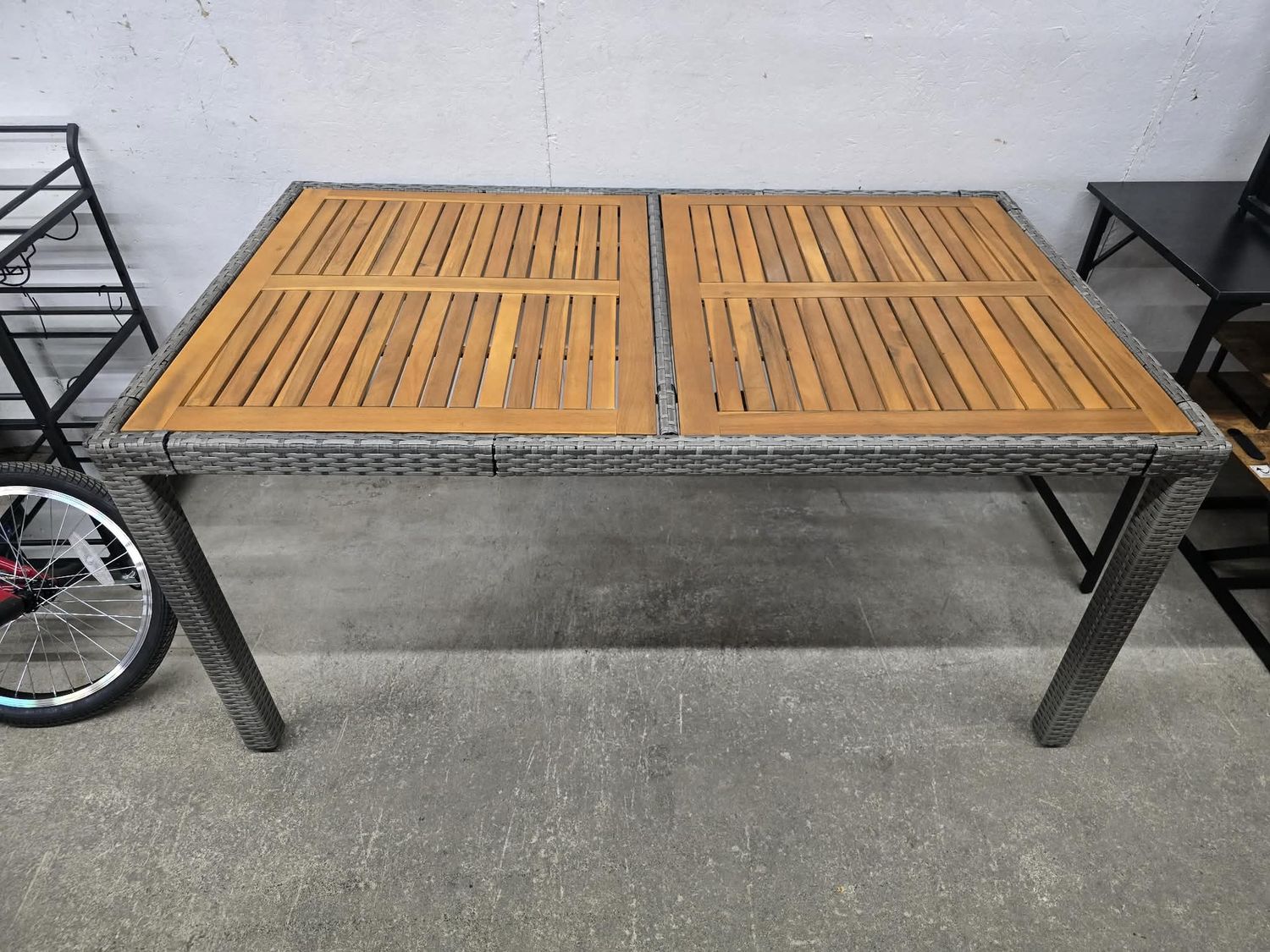 Rattan Outdoor Table 6 person Wicker &amp; wood slat top MSRp $400.00