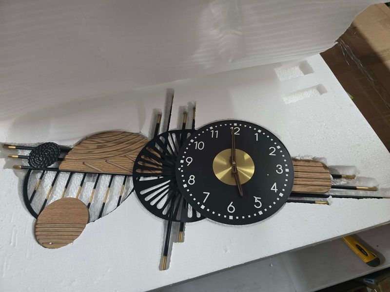 Modern Mid-Century Metal Wall Clock – 36" x 20" Modern Mid-Century Metal Wall Clock – 36" x 20"