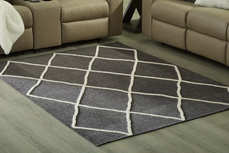 Signature Design by Ashley Stardo Black/Ivory Area Rug – 8' × 10