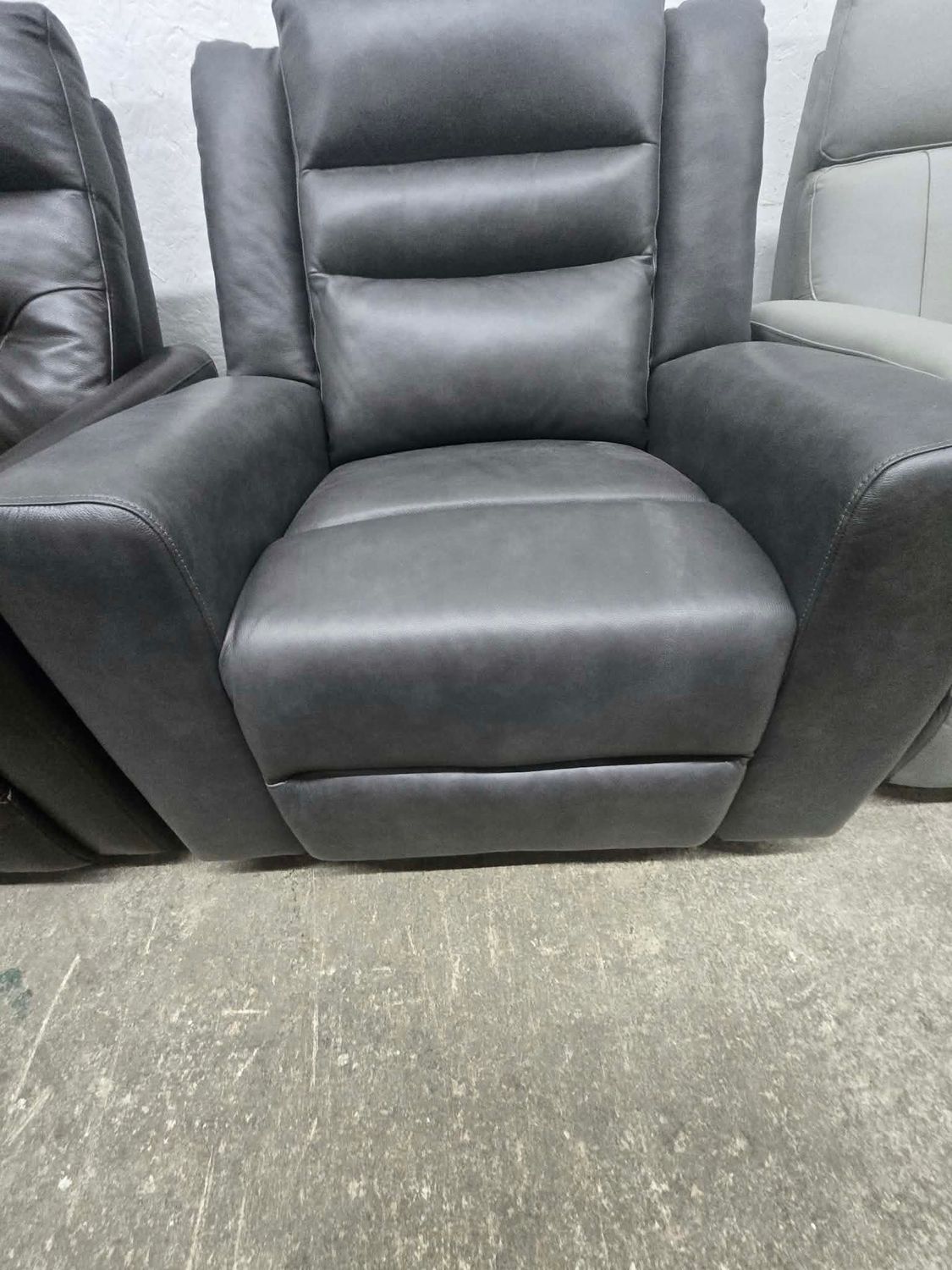 Monterrey Hills Top-grain Leather Glider Recliner with Arc Handle MSRP $699.99 Monterrey Hills Top-grain Leather Glider Recliner with Arc Handle MSRP $699.99
