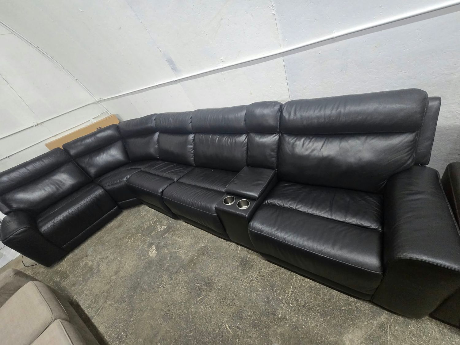 Gilman Creek 6-Piece Full-Grain Leather Motorized Sectional MSRP $3699.99 Gilman Creek 6-Piece Full-Grain Leather Motorized Sectional MSRP $3699.99